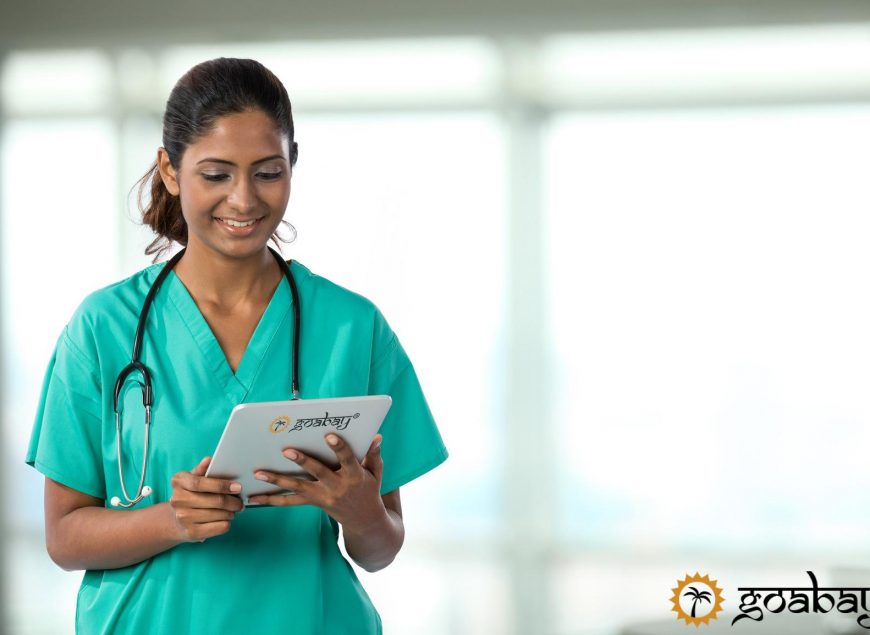 Portrait of a Female Indian doctor holding a digital tablet.